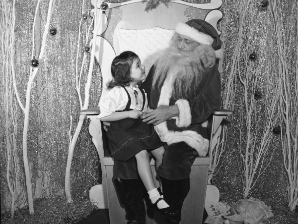 Santa visits with children at Younker-Davidson store